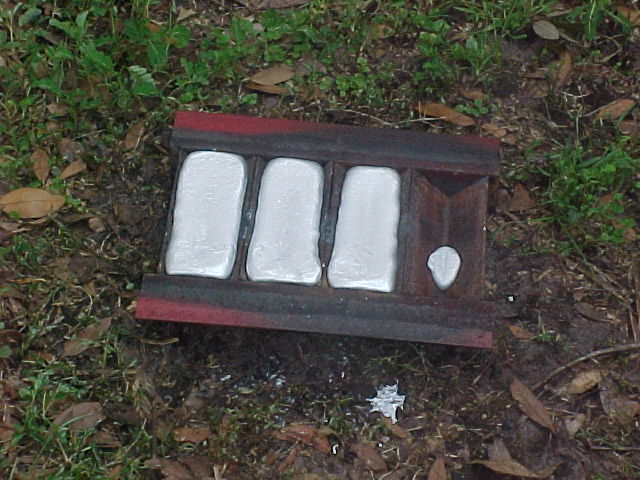 3 ingots poured into ingot mold.jpg